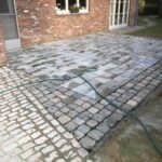 Terras aanleggen in Kortenberg met natuursteen en kasseien - projectfoto 3 - Realisatie door PSBRUK Eeklo