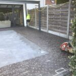 Terras en tuinpad in Evergem met donkere kasseien - projectfoto 3 - Realisatie door PSBRUK Eeklo